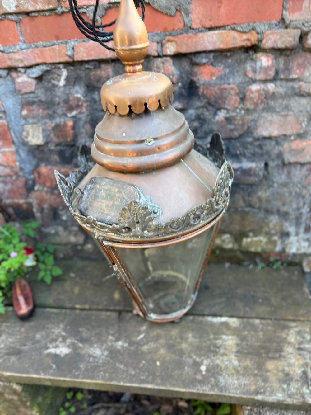 A large Edwardian copper and glass hanging lantern featuring decorative cresting and a top suspension loop. View V