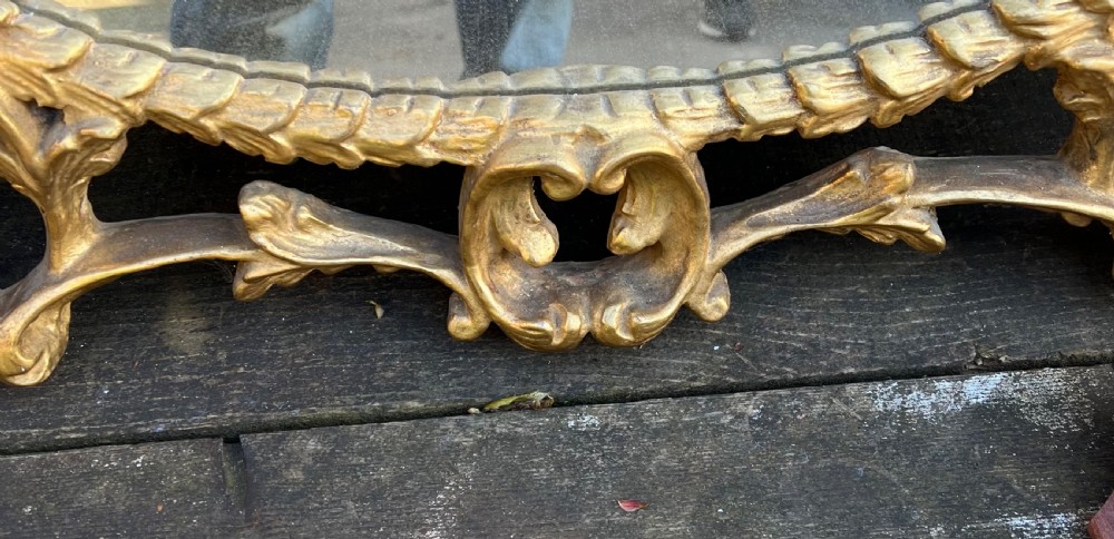 Italian Carved giltwood mirror in the rococo taste  View V