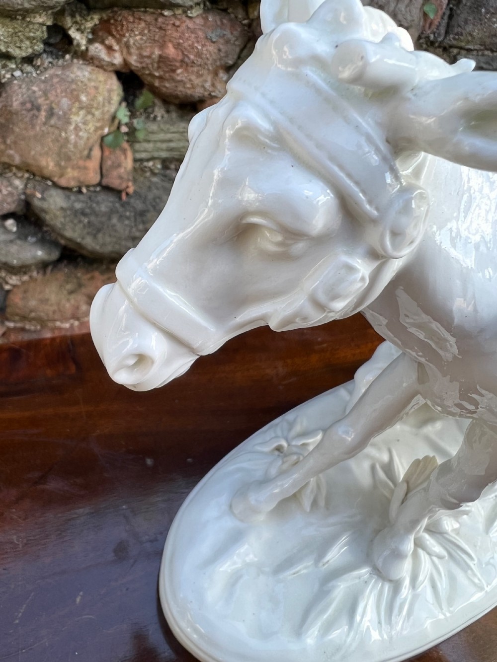 Pair of porcelain figures by moore bros, depicting a man and a woman riding donkeys  View V