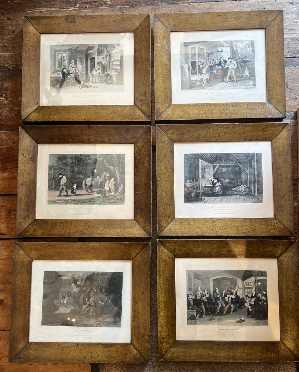 Set of six antique stipple engravings of the progress of intemperance in faux maple painted frames 
