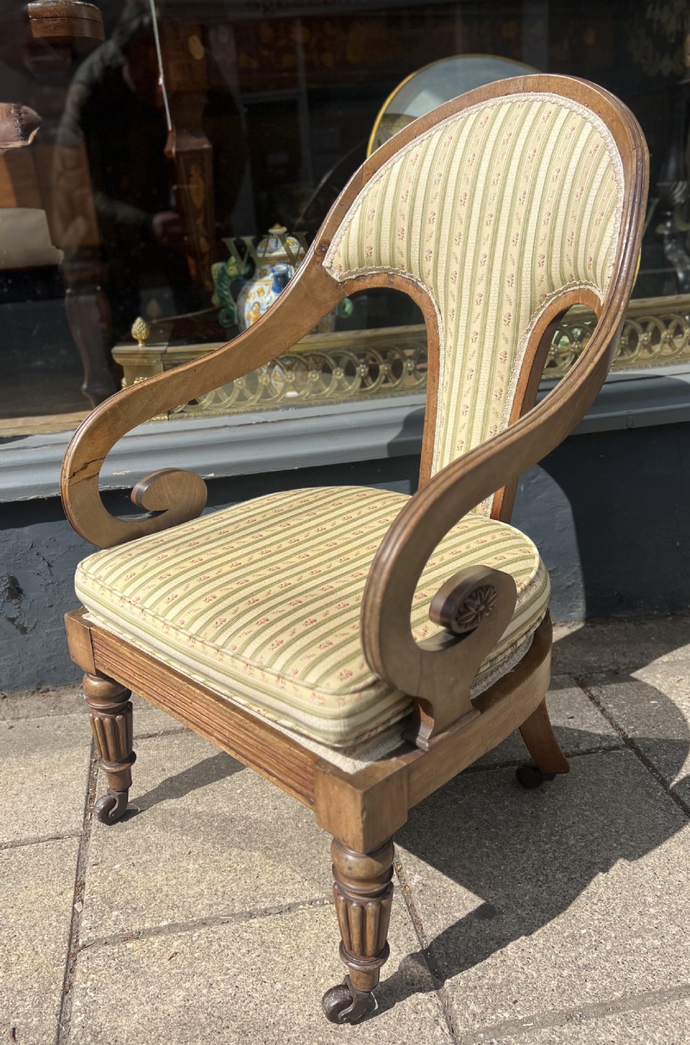 Swept back mahogany armchair in the manner of gillows 