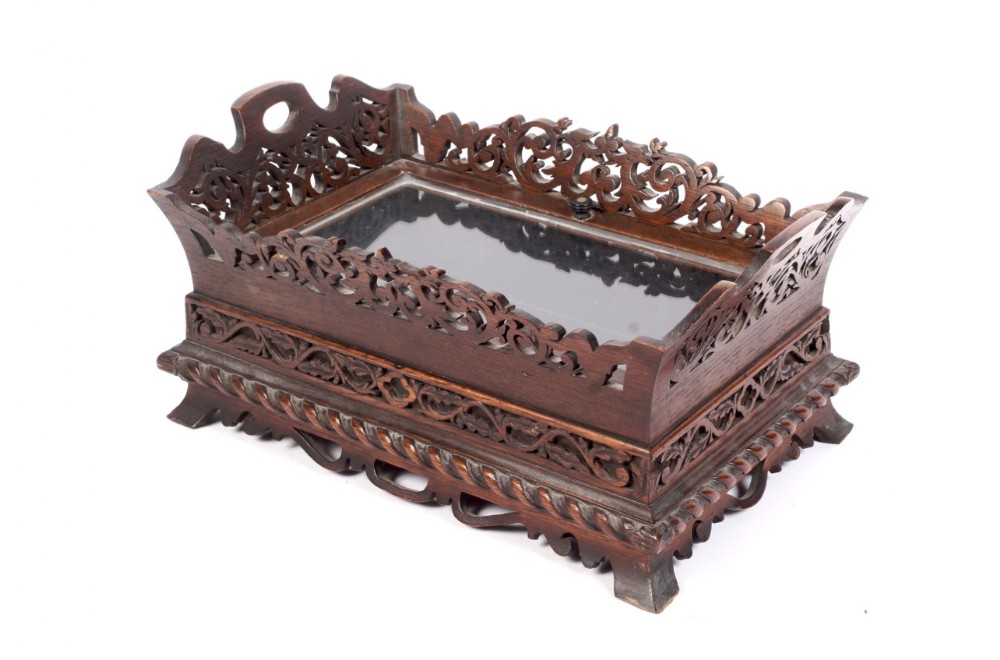 A C19th fretworked glazed table top bijouterie cabinet 