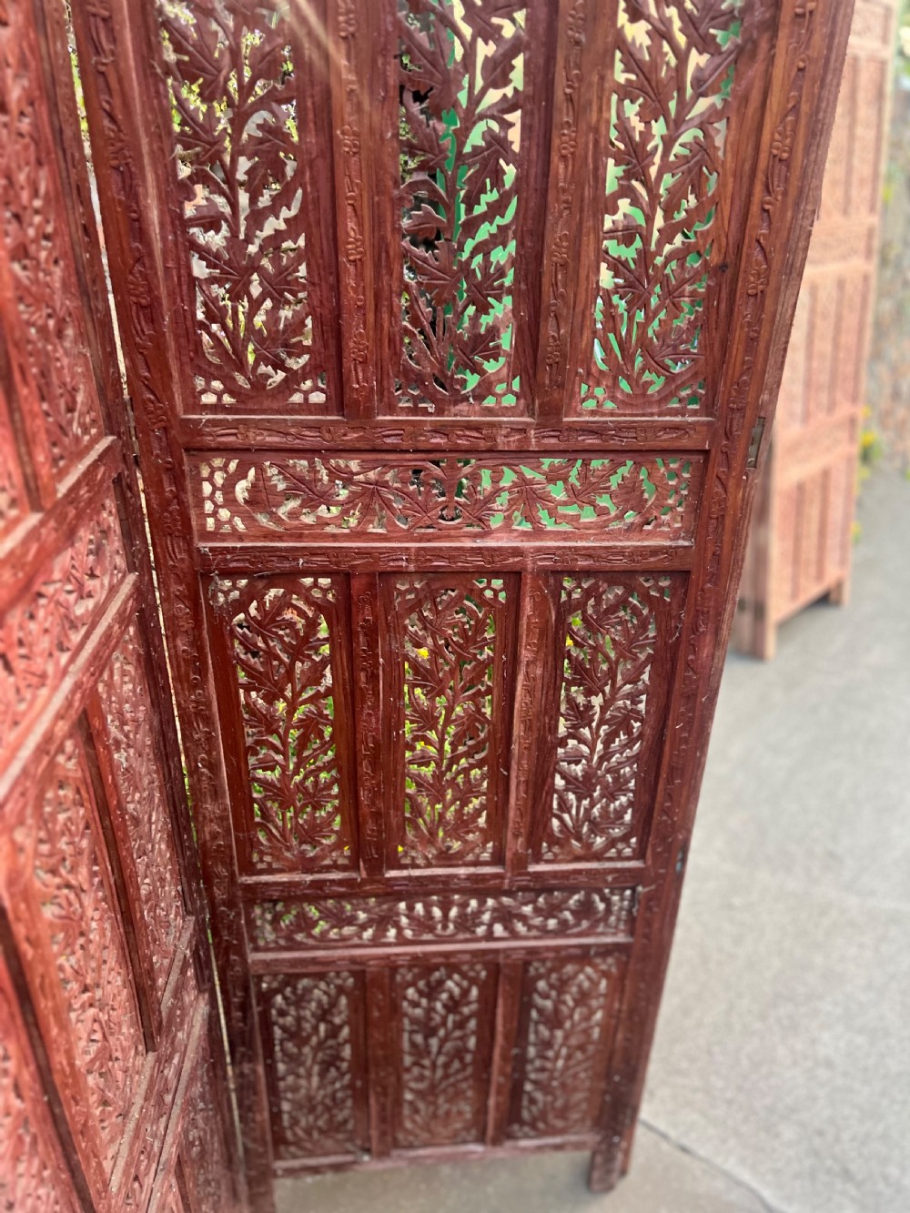 A carved wood Indian four fold screen  View V