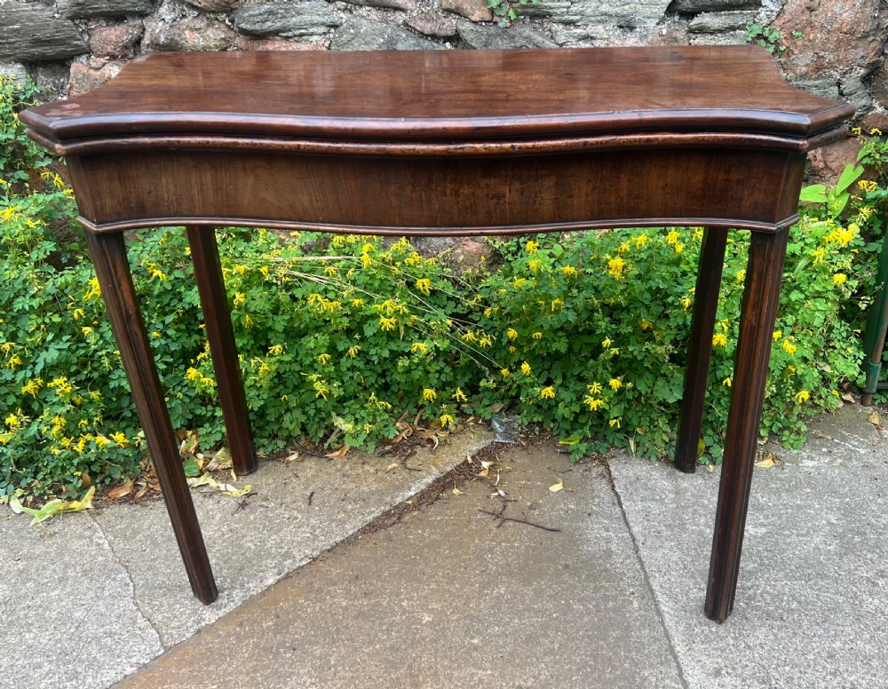 George III serpentine fronted mahogany tea table 
