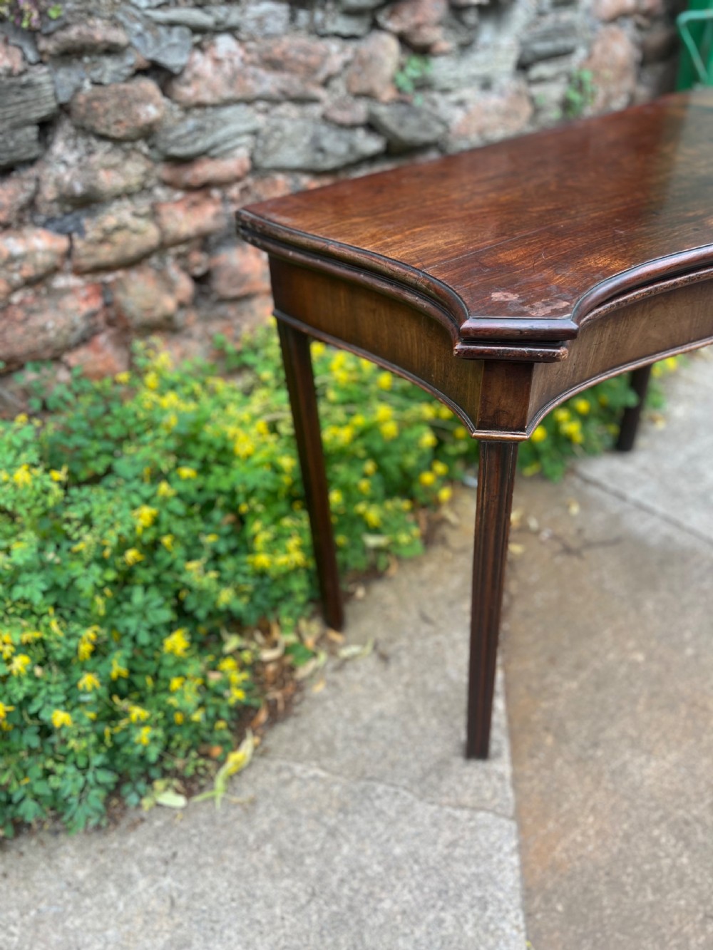 George III serpentine fronted mahogany tea table  View III