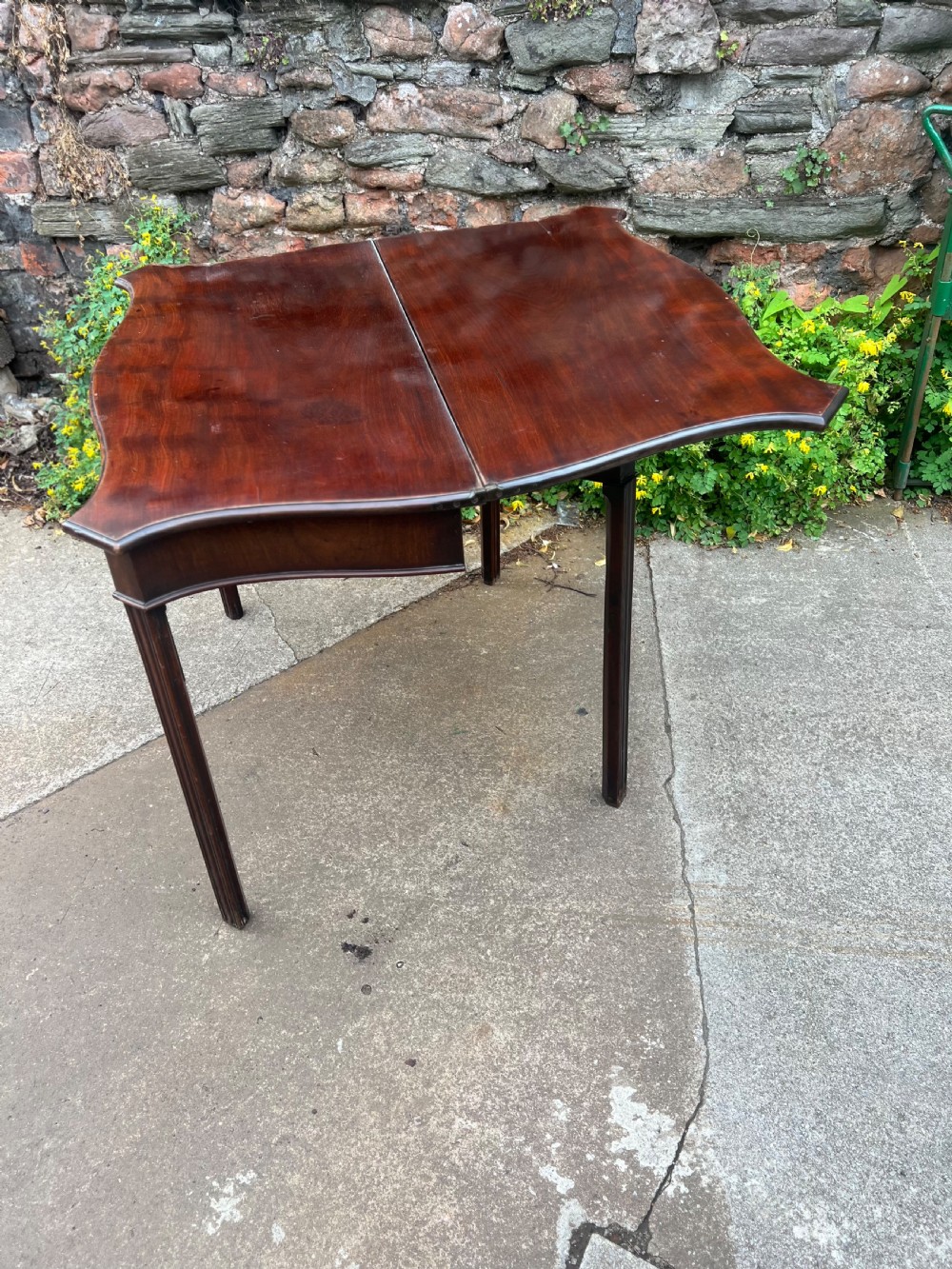 George III serpentine fronted mahogany tea table  View IV
