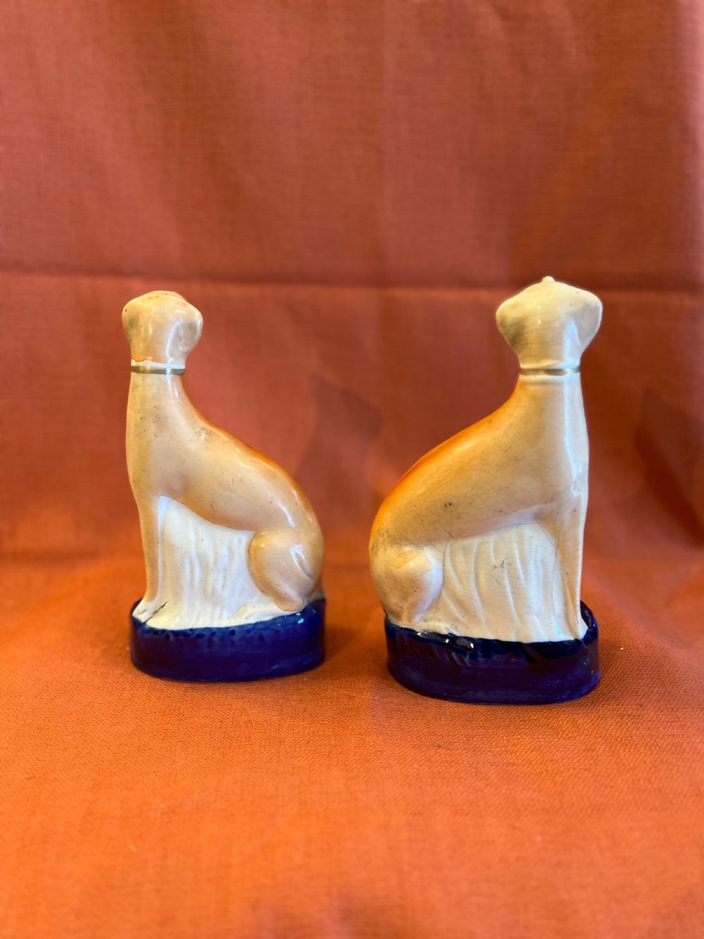 A pair of Staffordshire pottery greyhounds  View III