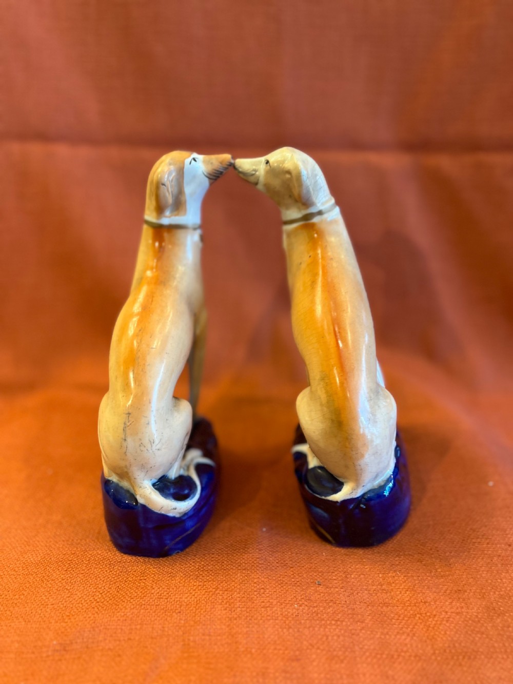 A pair of Staffordshire pottery greyhounds  View IV