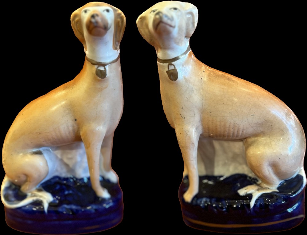A pair of Staffordshire pottery greyhounds  View VI