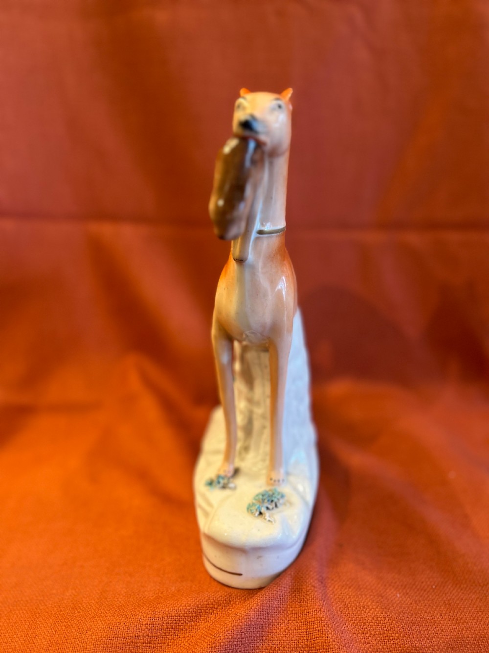 Pair of large Staffordshire greyhounds with hares in their  mouths  View IV