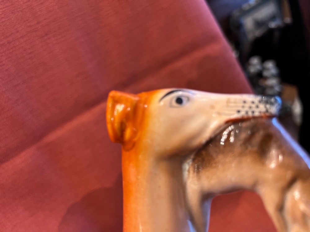 Pair of large Staffordshire greyhounds with hares in their  mouths  View VIII