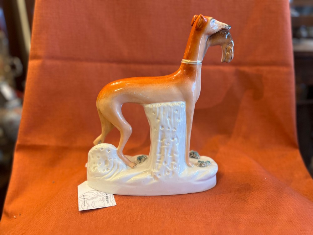 Pair of large Staffordshire greyhounds with hares in their  mouths  View XIV