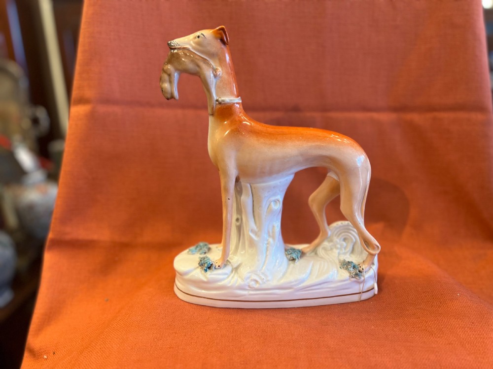 Pair of large Staffordshire greyhounds with hares in their  mouths  View XV