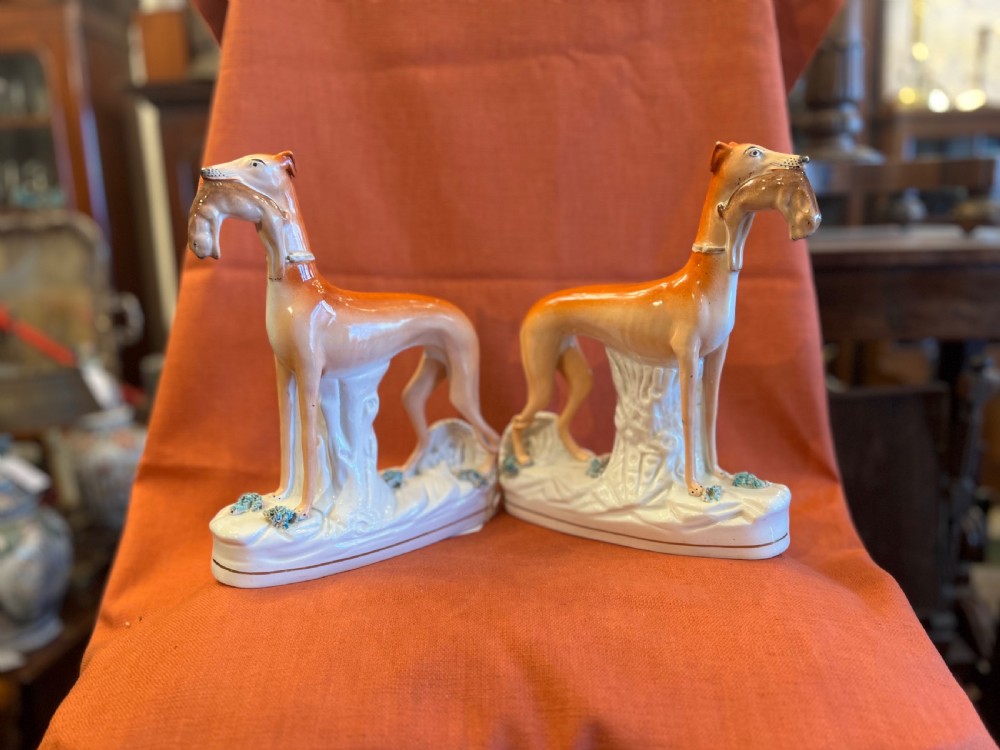 Pair of large Staffordshire greyhounds with hares in their  mouths  View XVI