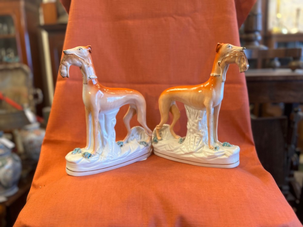 Pair of large Staffordshire greyhounds with hares in their  mouths  View XVII