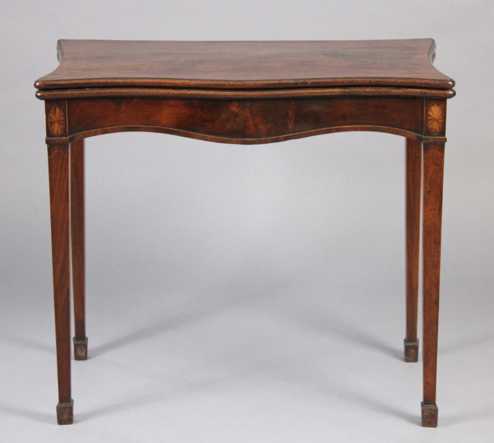 Georgian mahogany inlaid serpentine front card table 