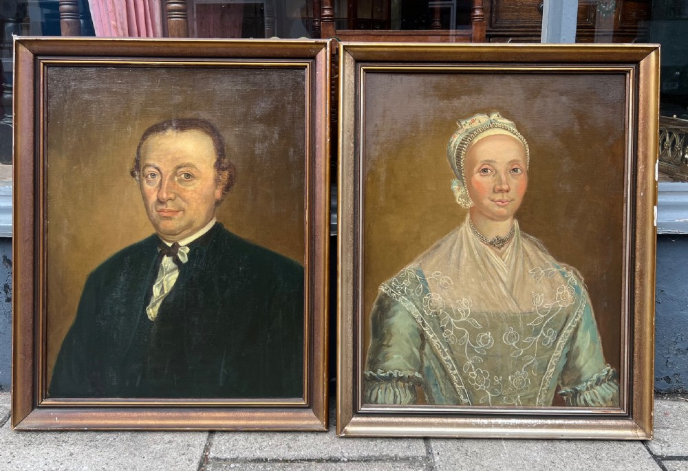 An C18th pair of oil on canvas portraits copied in the 1930s 