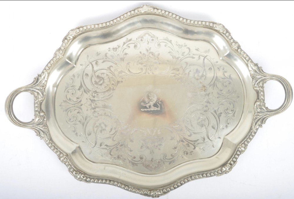 A large C19th silver plated chased footed tray 