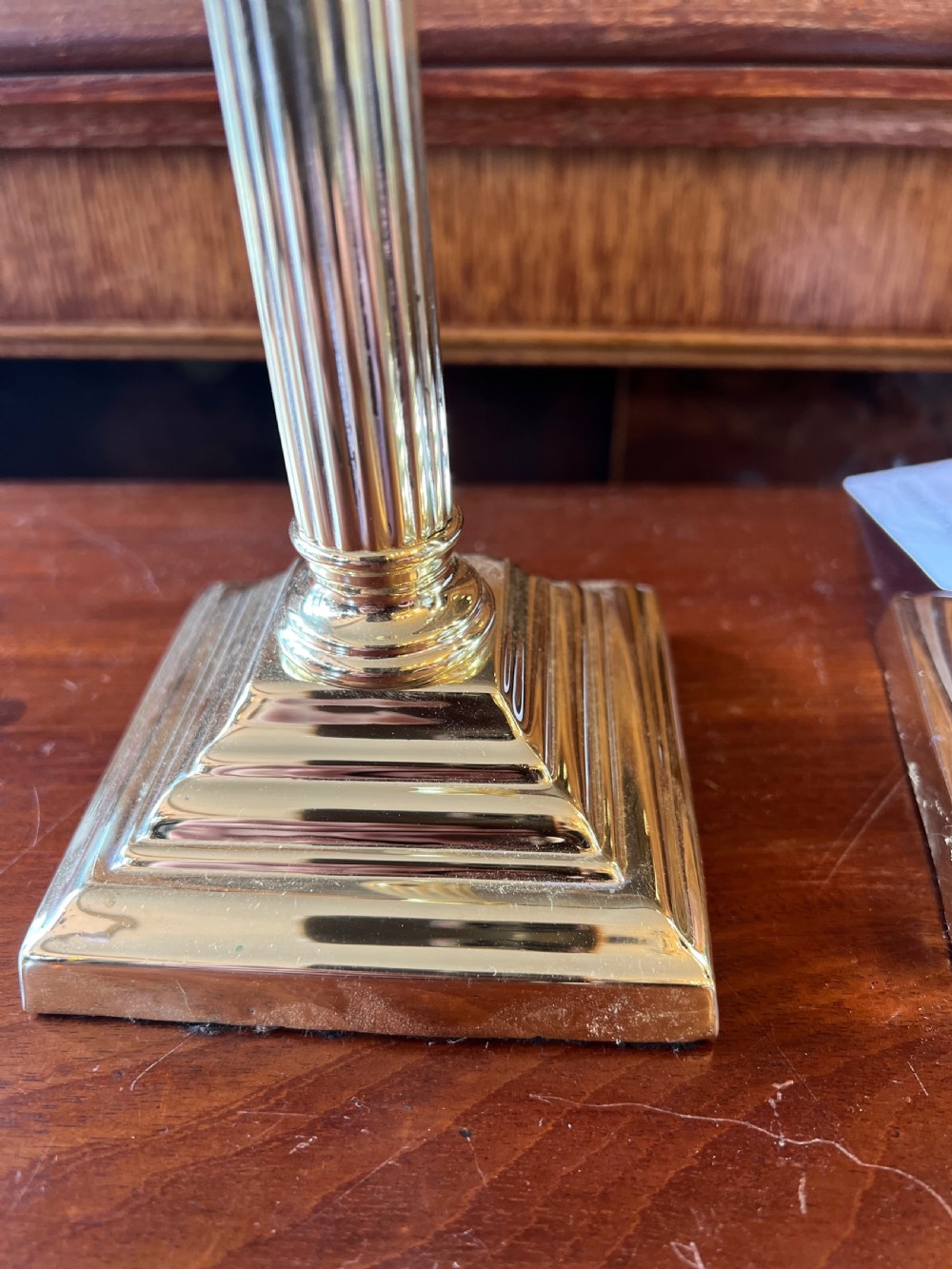 Pair of small brass Corinthian lamps  View III
