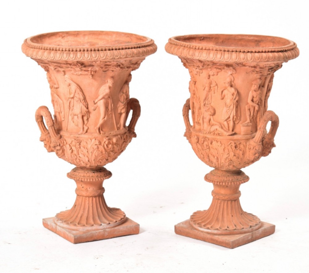 A pair of classical terracotta campana urns 