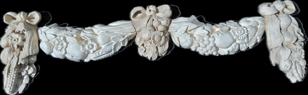 C18th carved wooden swag and festoons in five pieces 