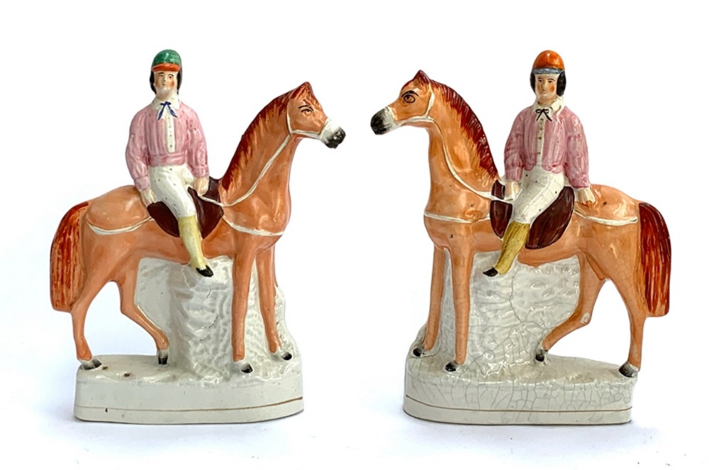 Pair of Staffordshire jockeys on horses 