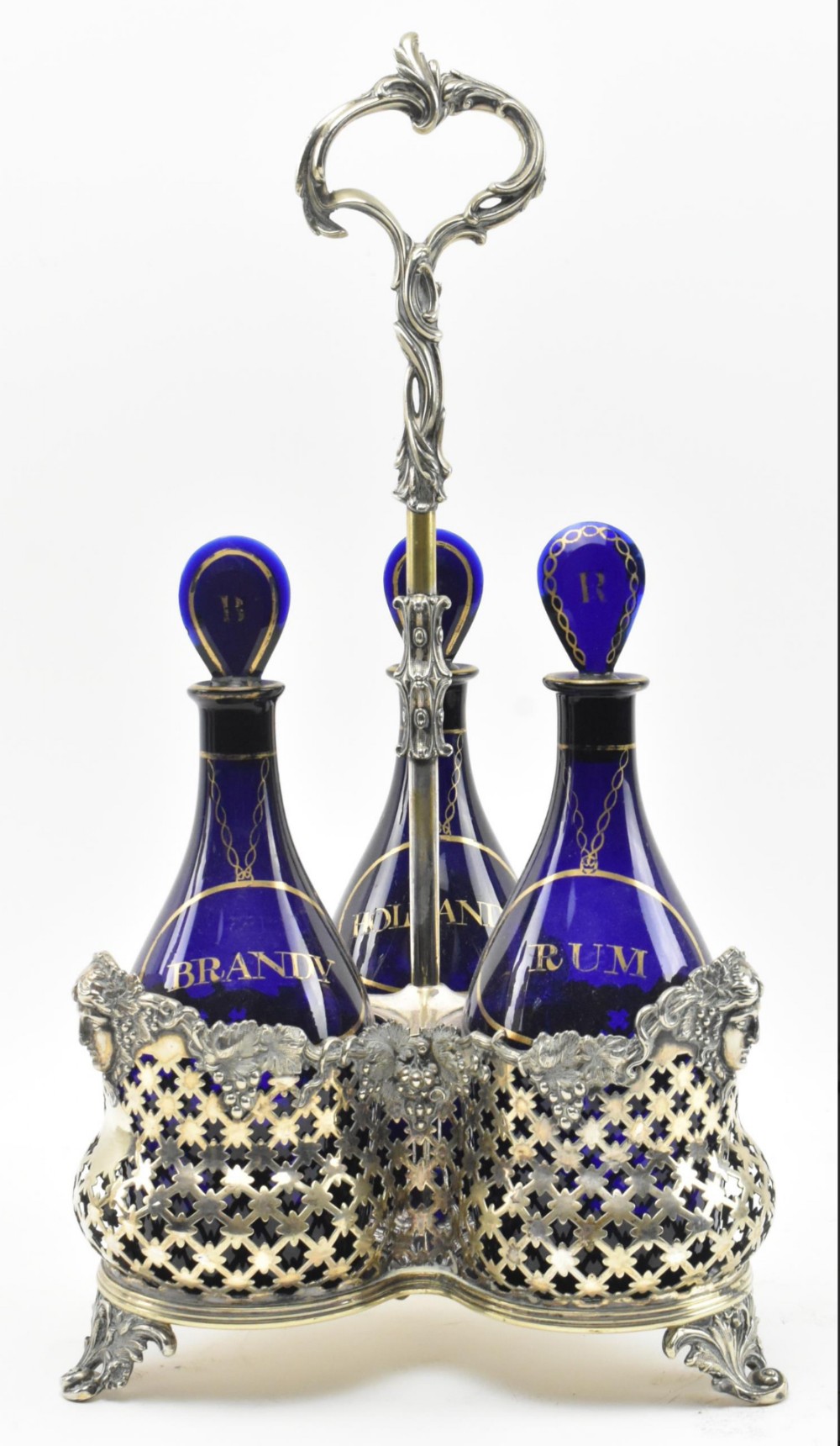 A C19th bristol blue decanters in a silver plated stand 