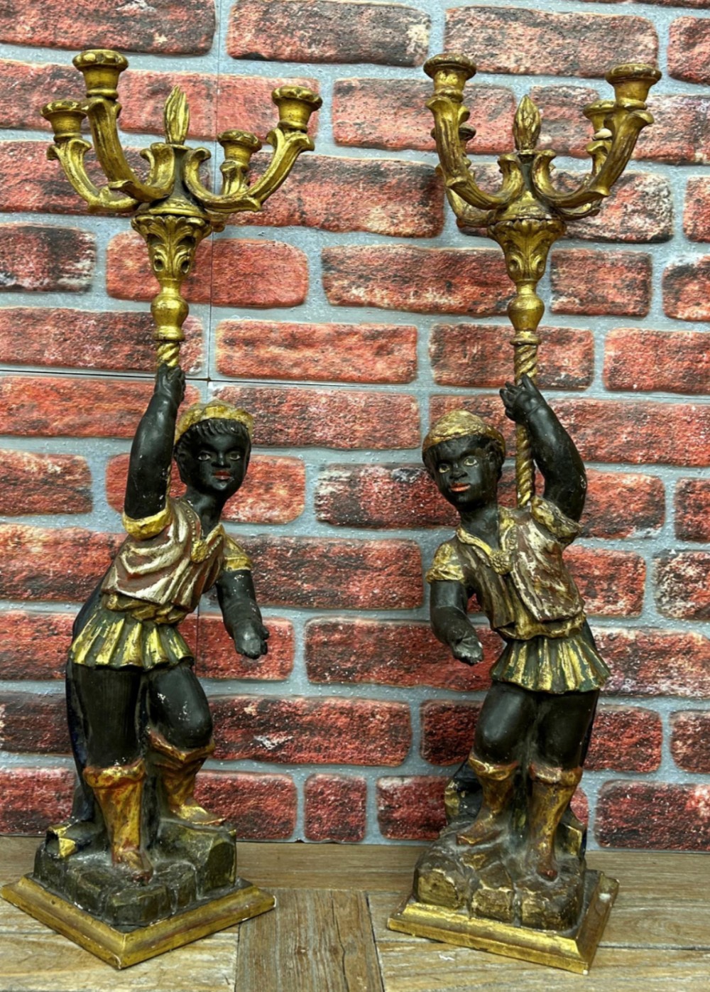 Pair of carved polychrome Blackamoor candelabra