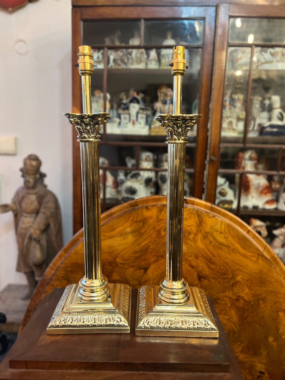 Pair of large brass Corinthian column table lamps  View II