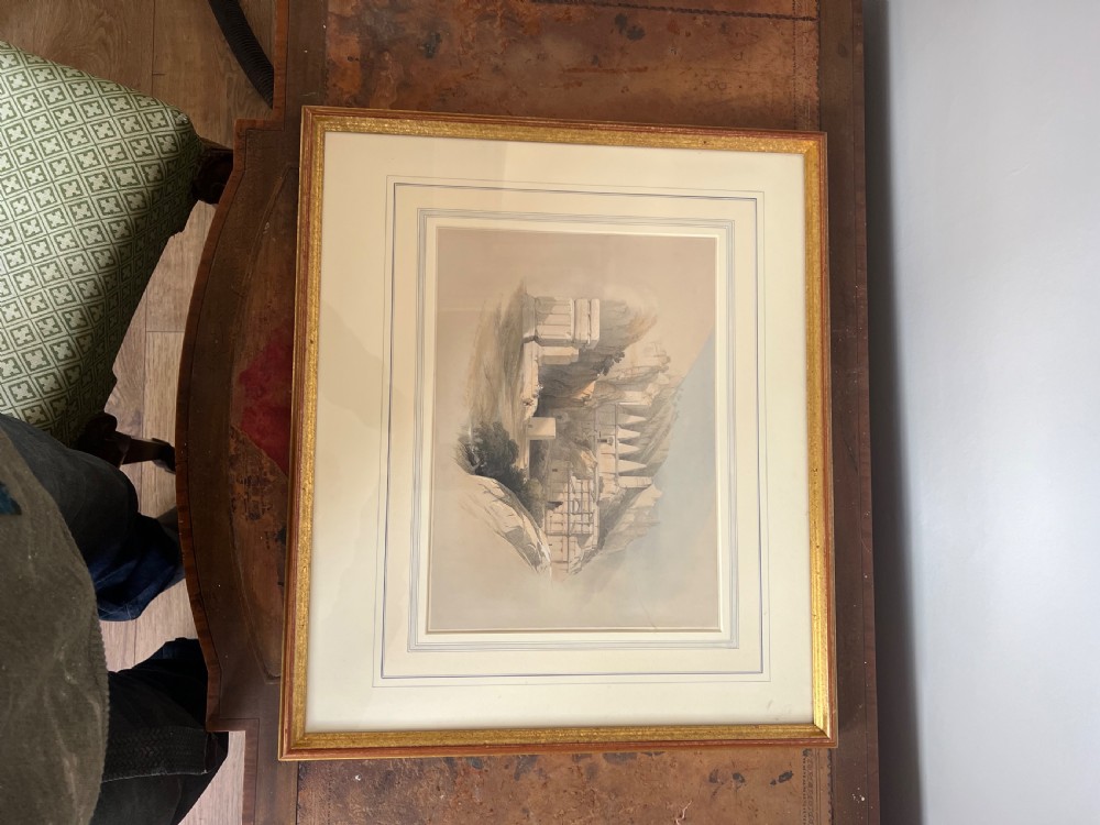 A pair of nineteenth-century tinted topographical prints depicting Middle Eastern architectural landscapes, displayed in gilt wood frames with multi-line cream mounts. View V