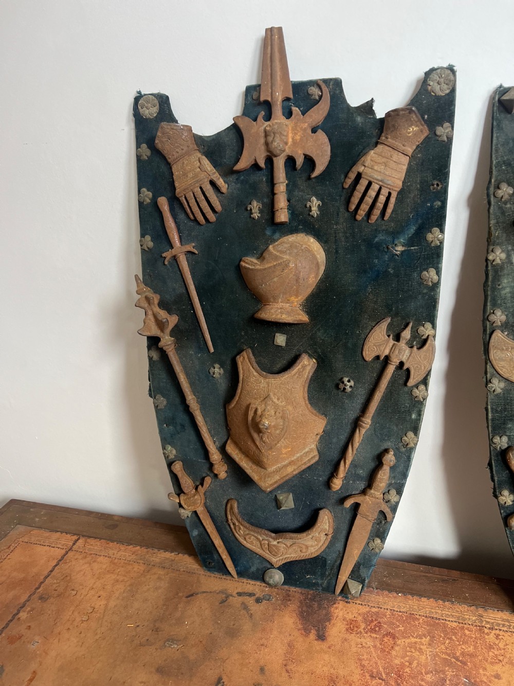 C19th display of miniature weapons in cast iron mounted on a velvet covered board  View IV