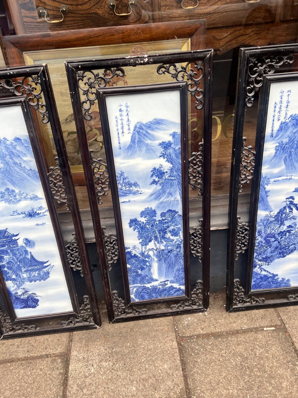 Set of four Chinese blue and white plaques in frames  View V