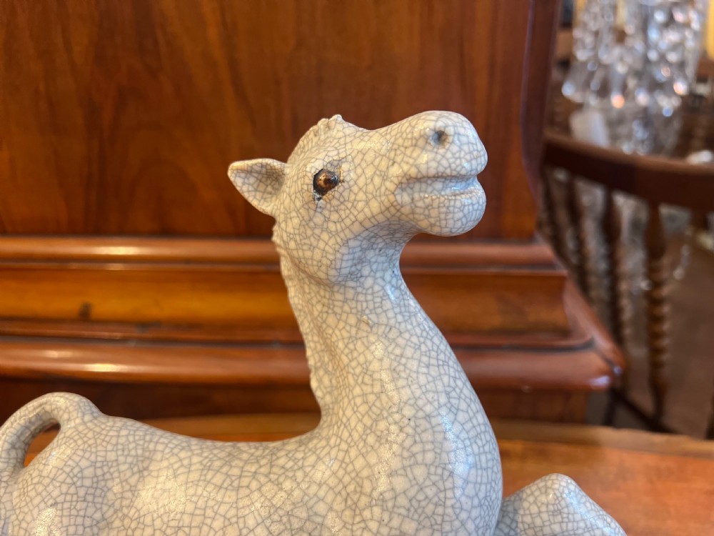 Japanese crackleglazed ceramic horse on carved wooden stand View II