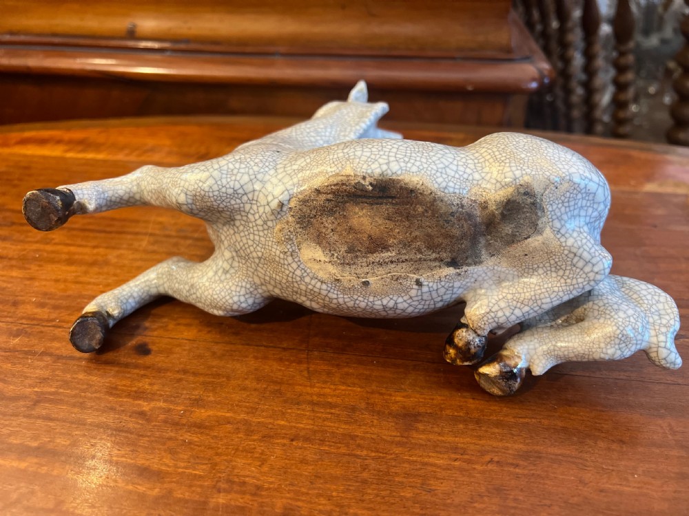 Japanese crackleglazed ceramic horse on carved wooden stand View VII