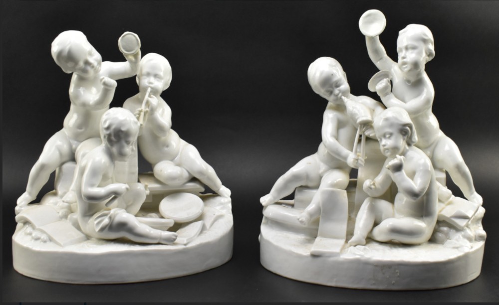 Pair of French blanc de chine figure groups 
