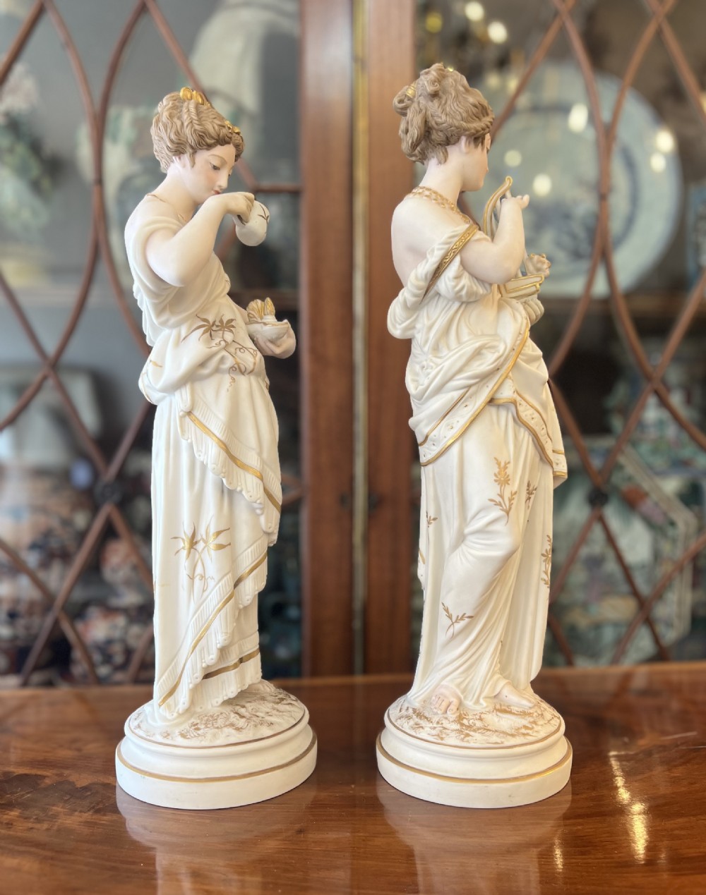 C19th bisque and gilded classical figures in the manner of Worcester  View II