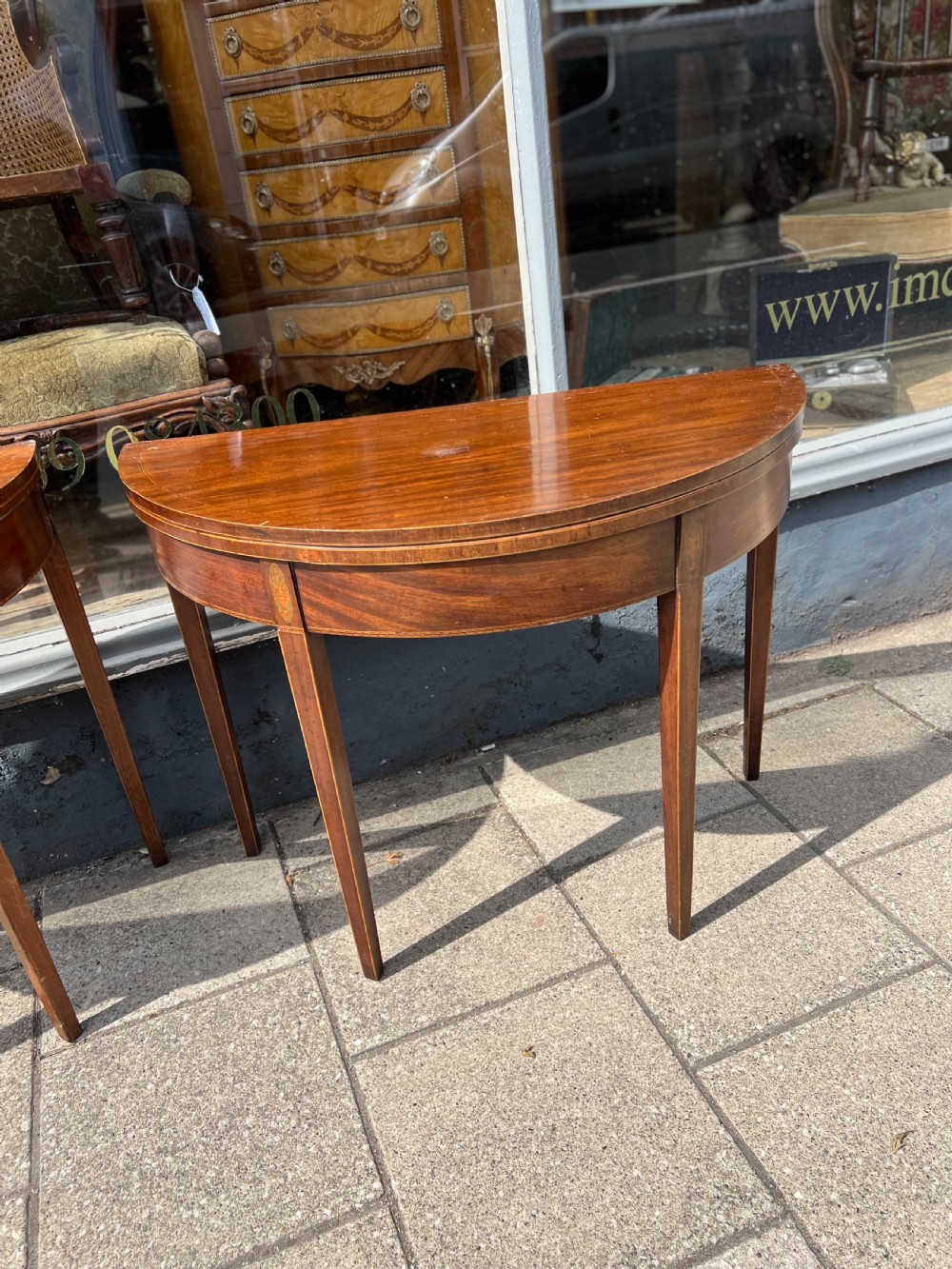 Near pair of Georgian Demi lune tables  View III