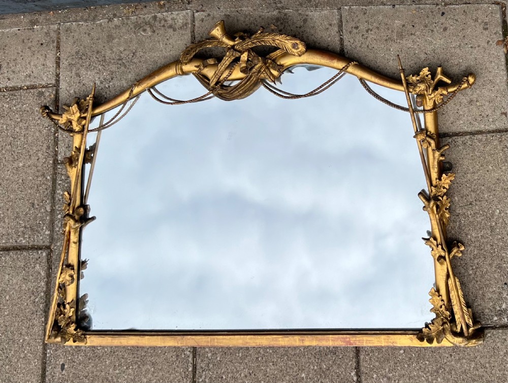 Gilded wall mirror by Charles Nosetti 
