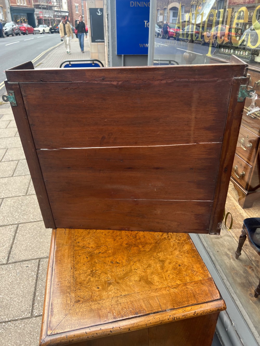 A three-tier Georgian mahogany wall shelf featuring turned spindle supports and open X-frame sides. View VI