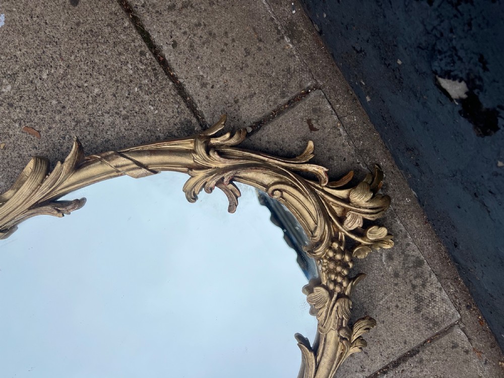 Pair of carved giltwood oval mirrors  View IV