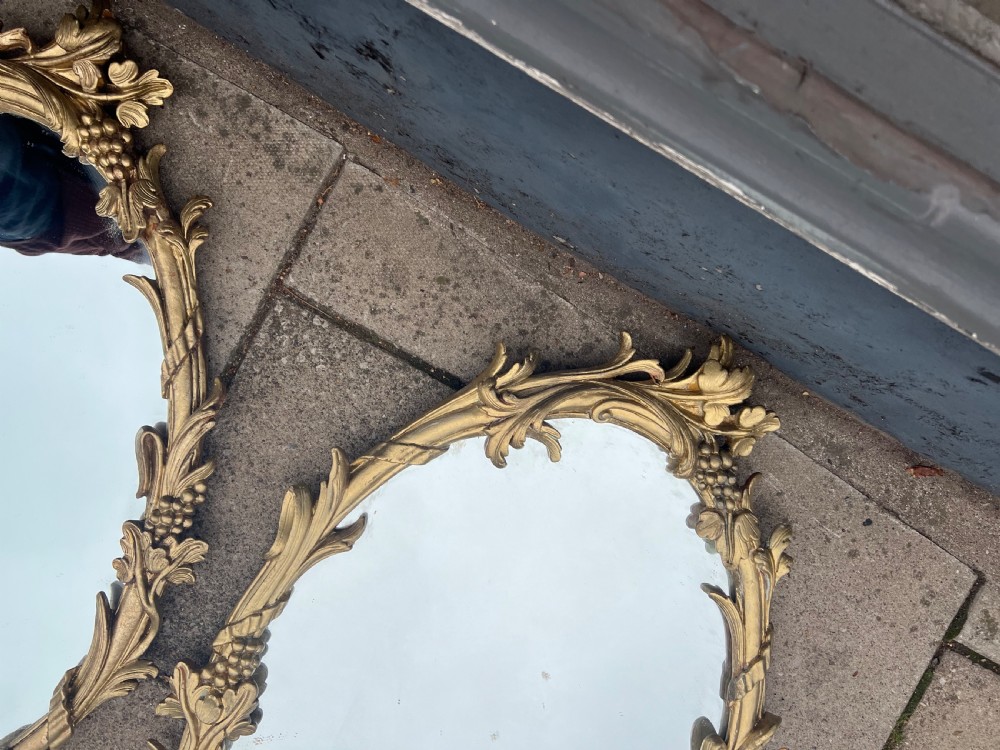 Pair of carved giltwood oval mirrors  View IX