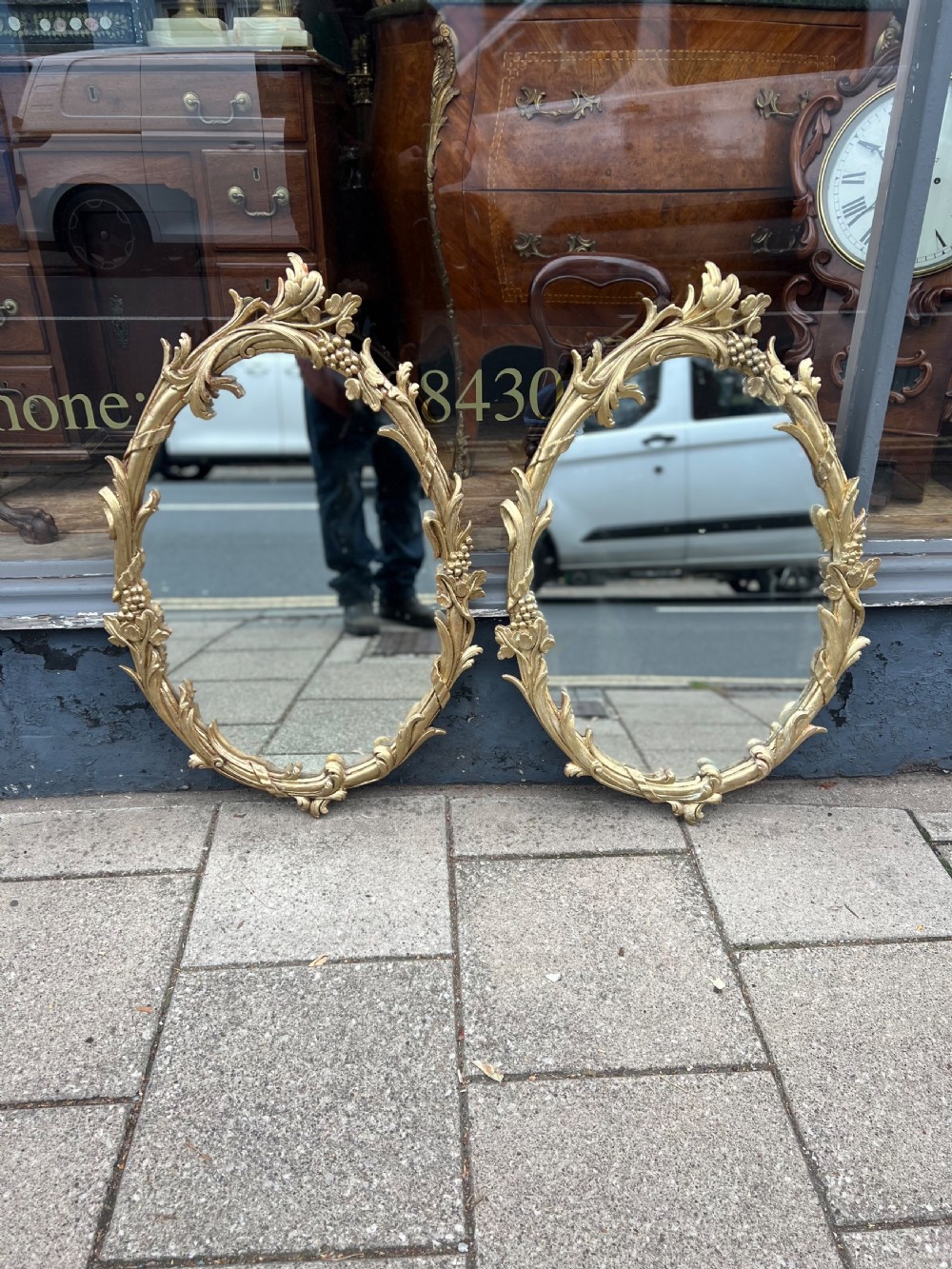 Pair of carved giltwood oval mirrors  View XIV