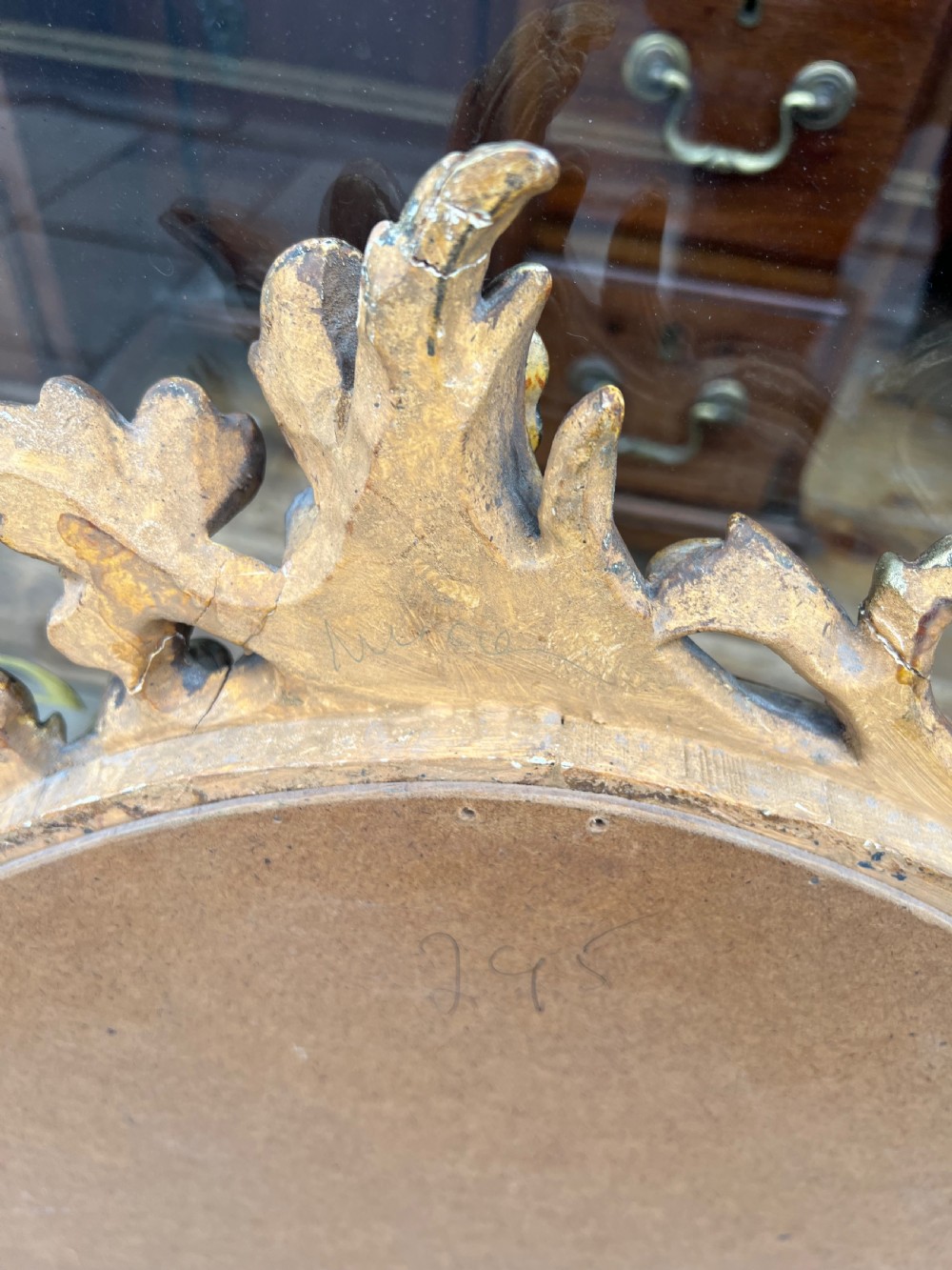 Pair of carved giltwood oval mirrors  View XVII
