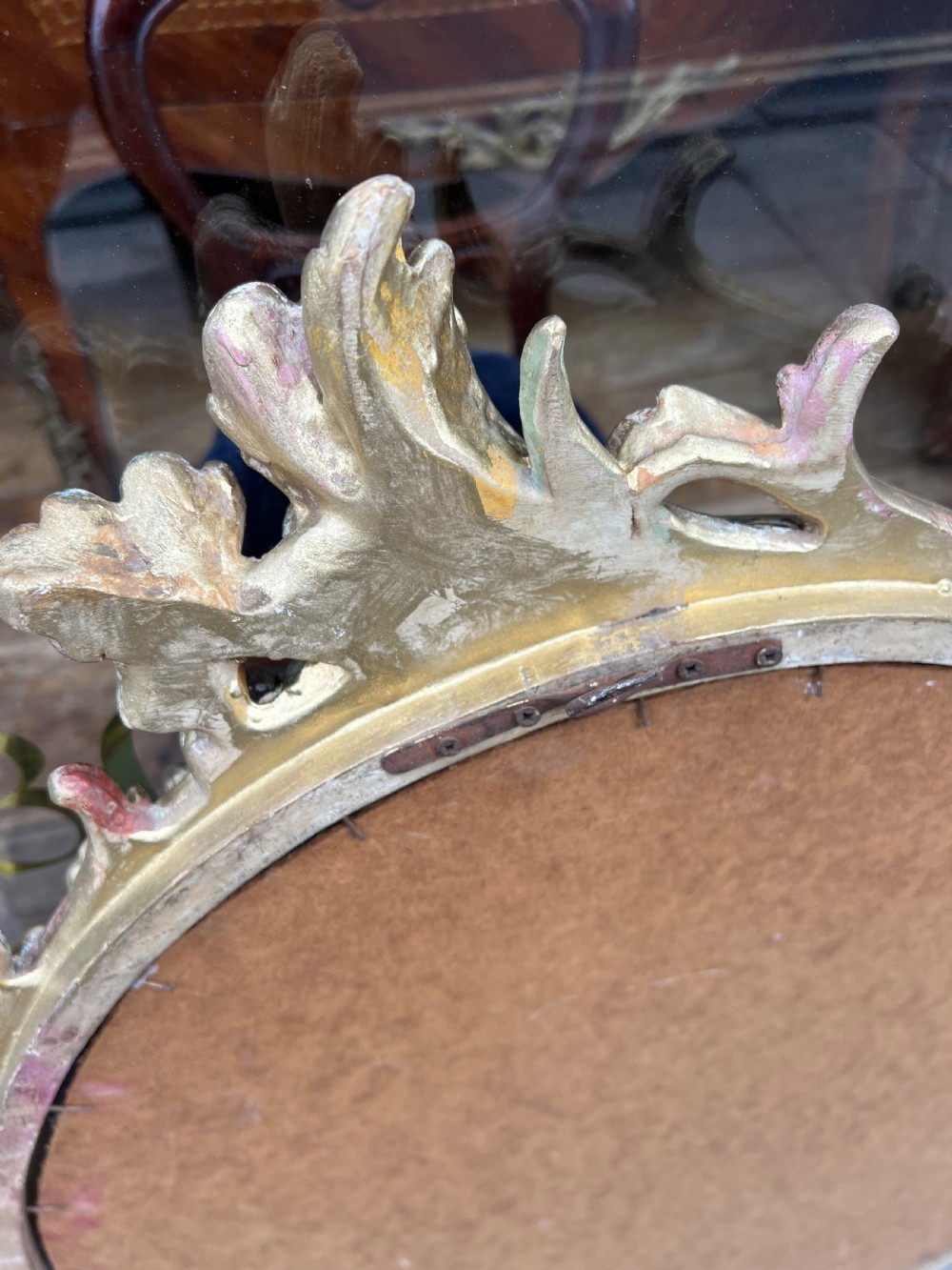 Pair of carved giltwood oval mirrors  View XIX