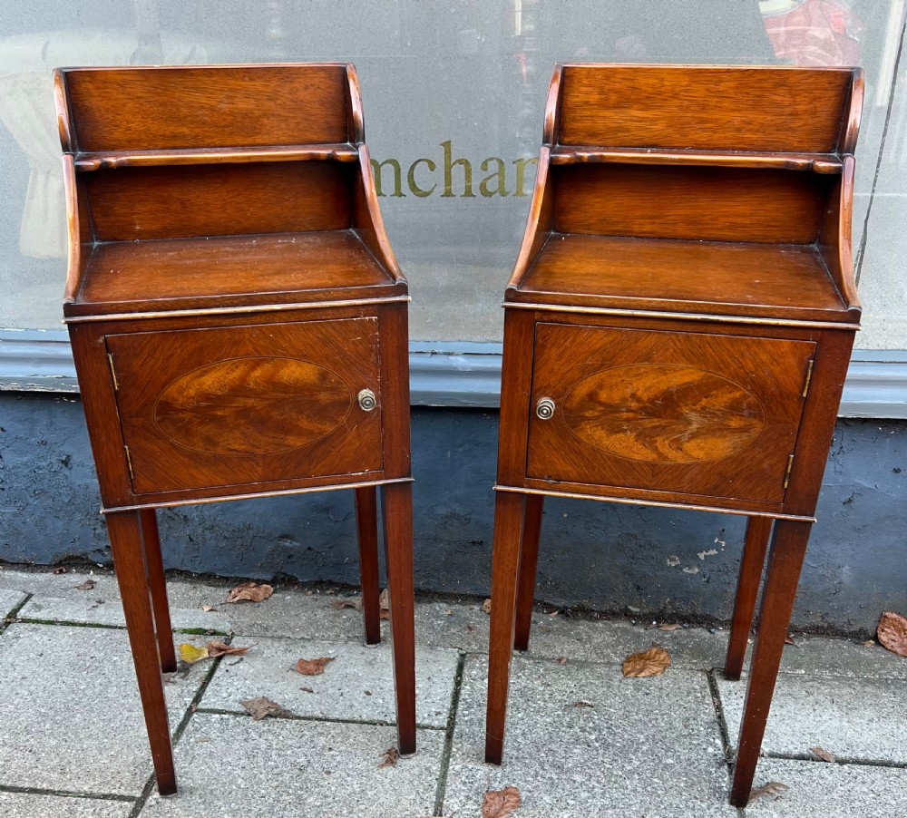 A pair of mahogany bedside cupboards  View II