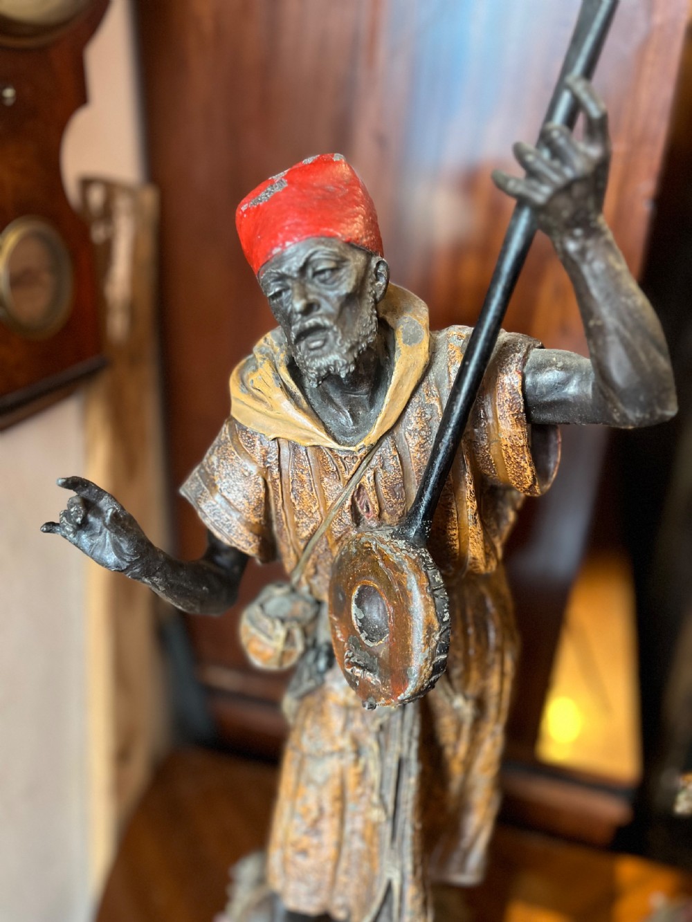 Pair of large painted spelter figures of Moroccan dancer and musician  View II