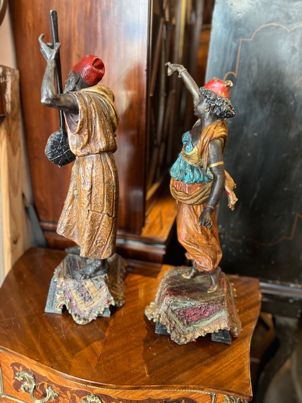 Pair of large painted spelter figures of Moroccan dancer and musician  View V