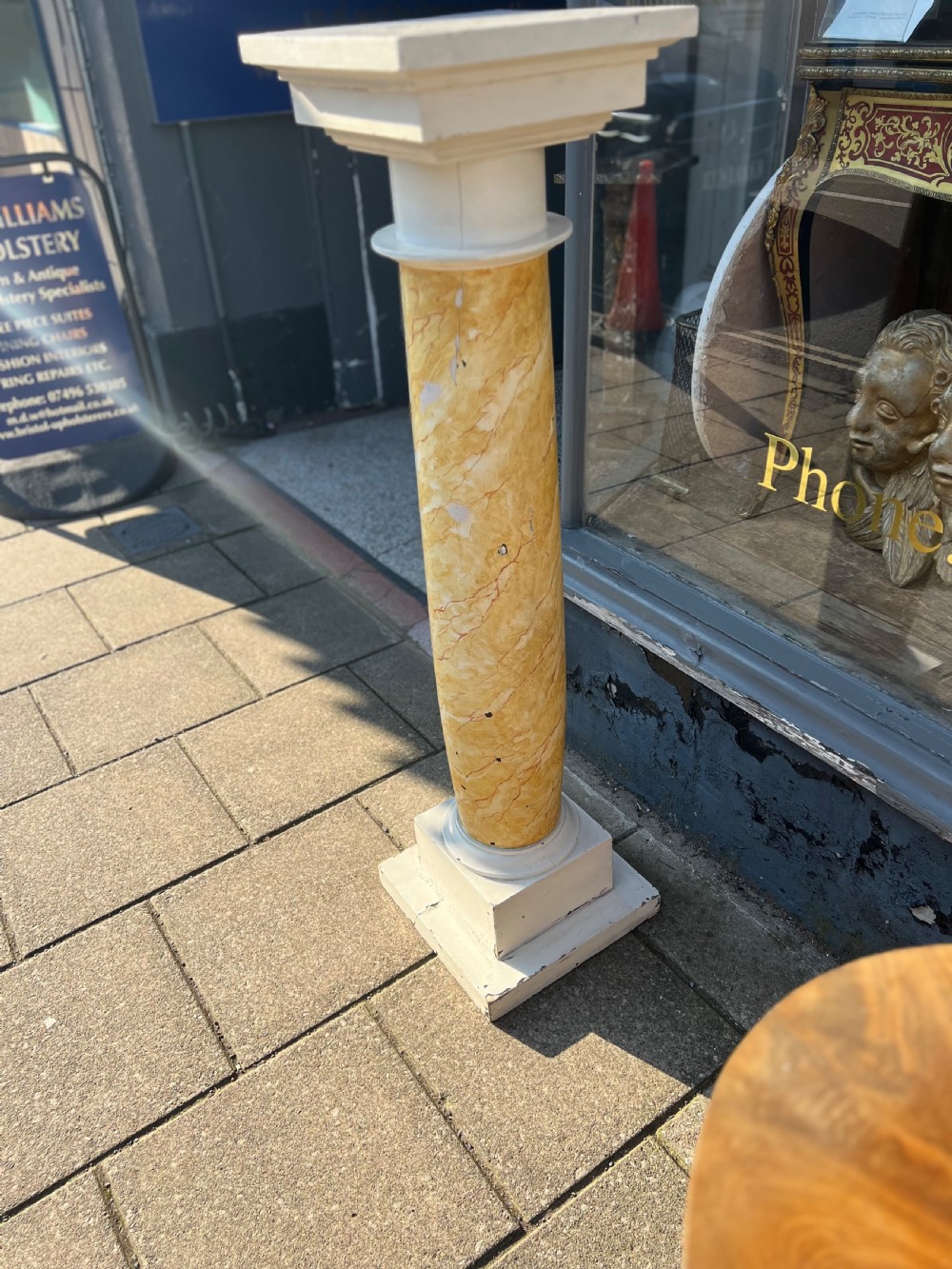 A 19th-century architectural column pedestal featuring hand-painted yellow faux marble veining with a cream-painted capital and base. View IV