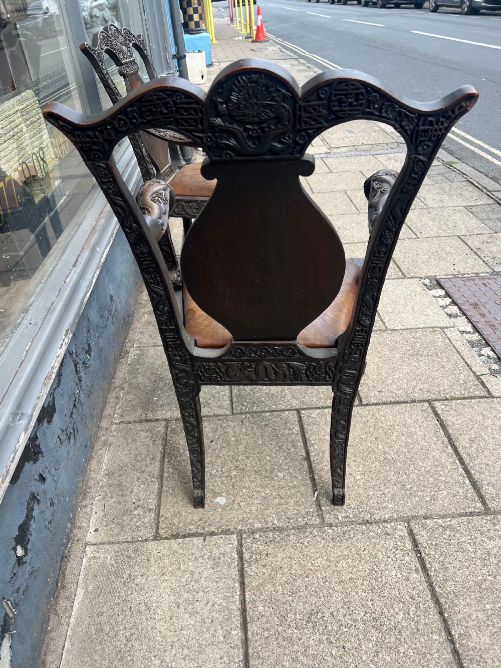 A pair of early C19th Chinese armchairs with crest to centre  View VII