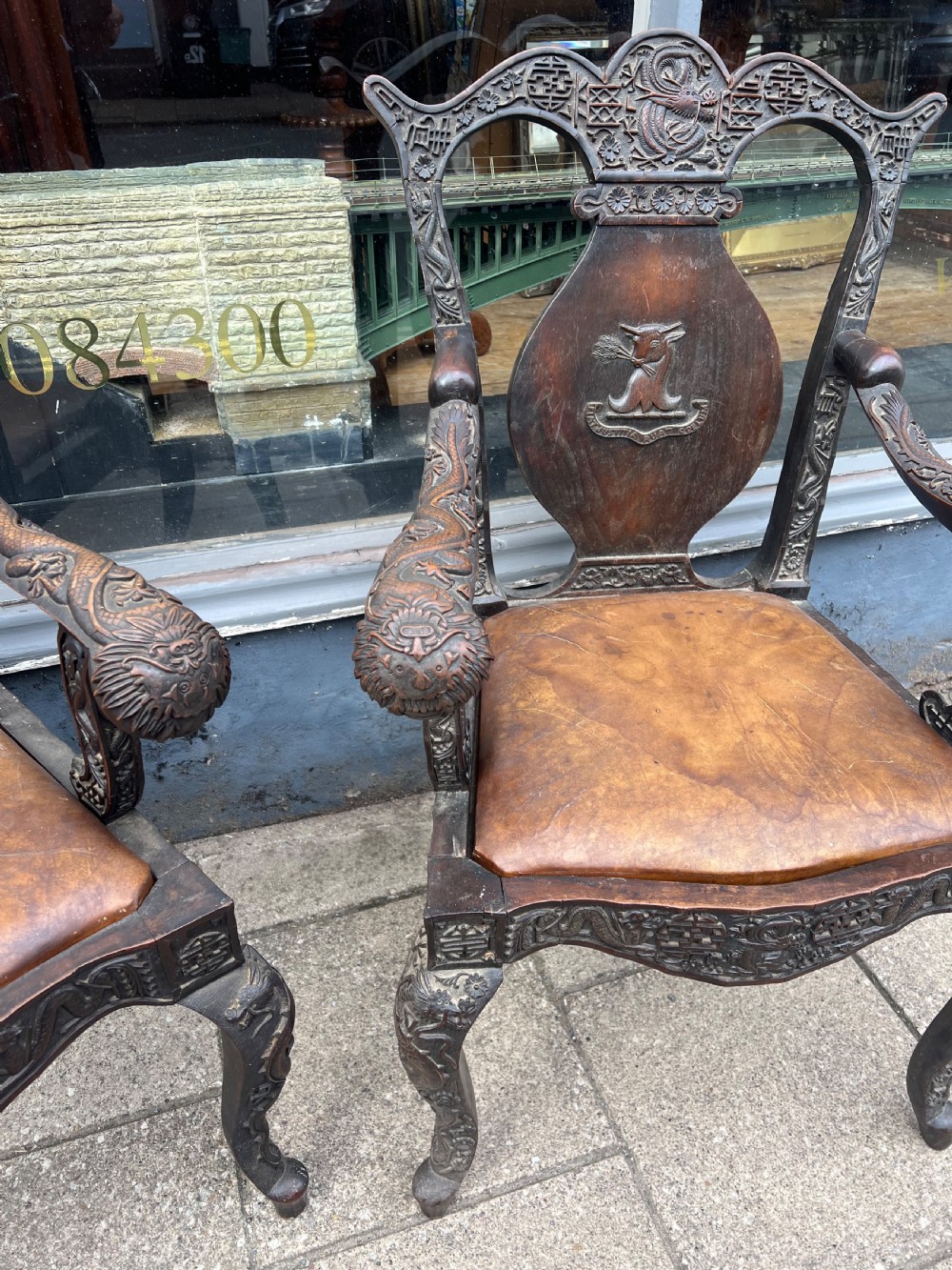 A pair of early C19th Chinese armchairs with crest to centre  View VIII